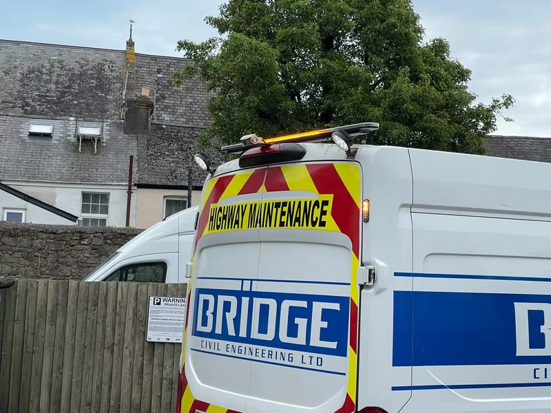 Work lights and an amber warning light fitted to a commercial van