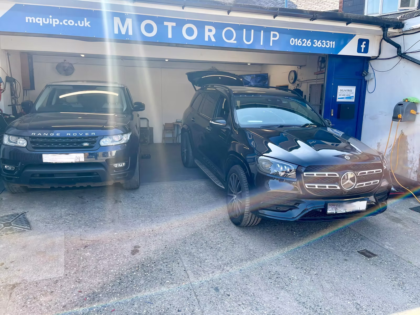 Vehicles at the Motorquip workshop in Newton Abbot